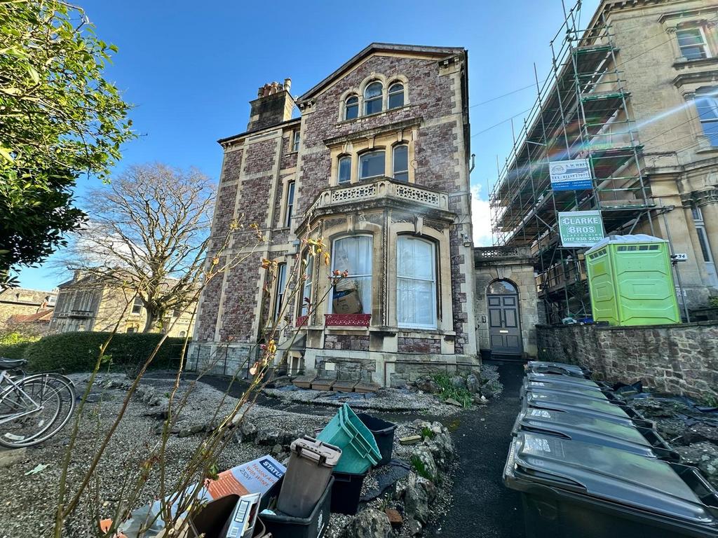Charming front view of a historic property show...