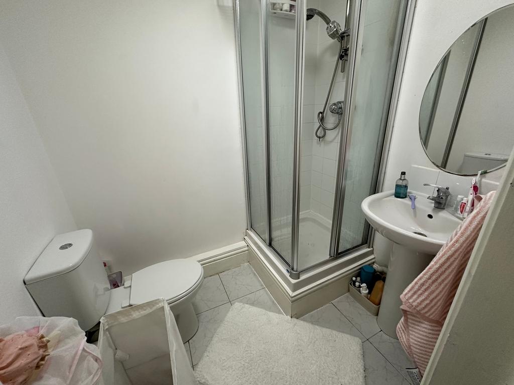 A bright and functional bathroom featuring a mo...