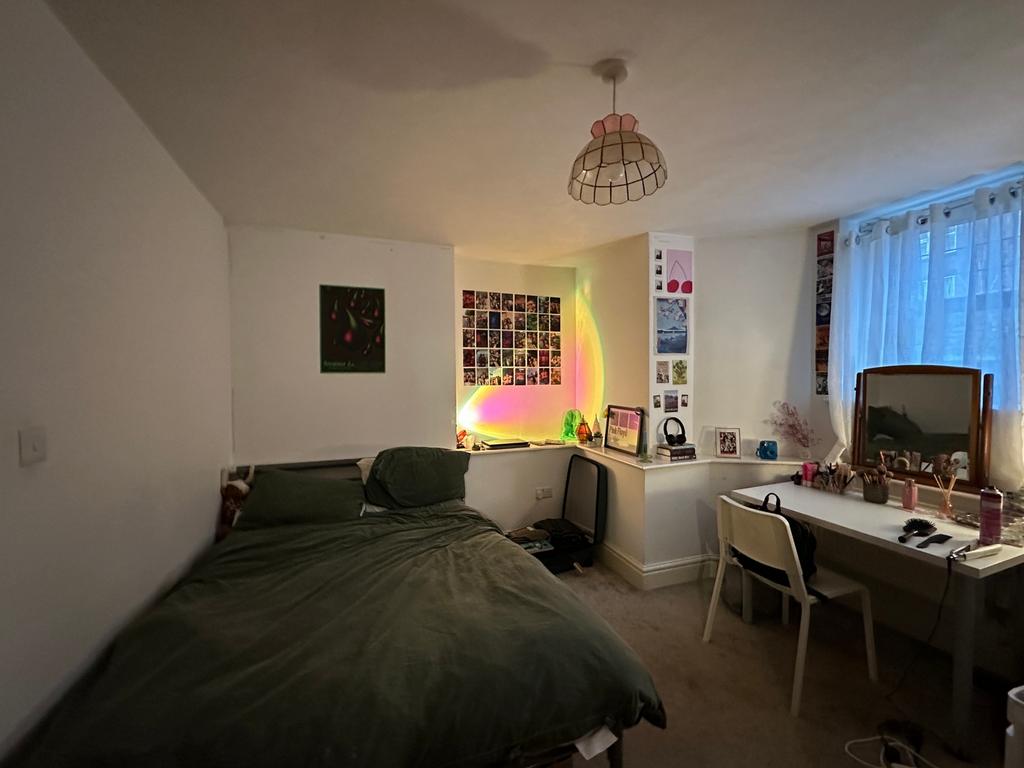 A spacious and inviting large double bedroom, p...