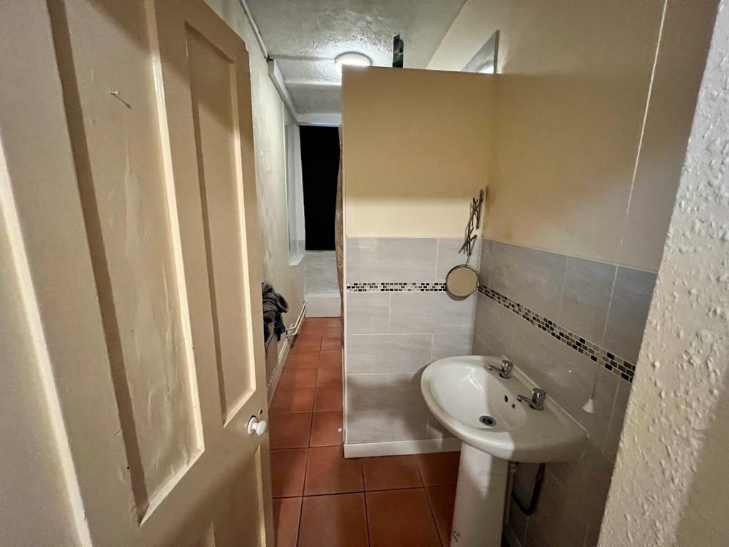 A functional bathroom featuring modern fixtures...