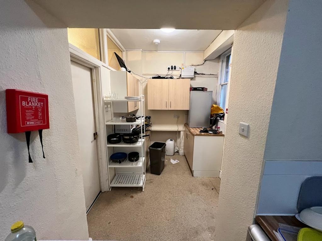 A functional kitchen with ample storage and wor...