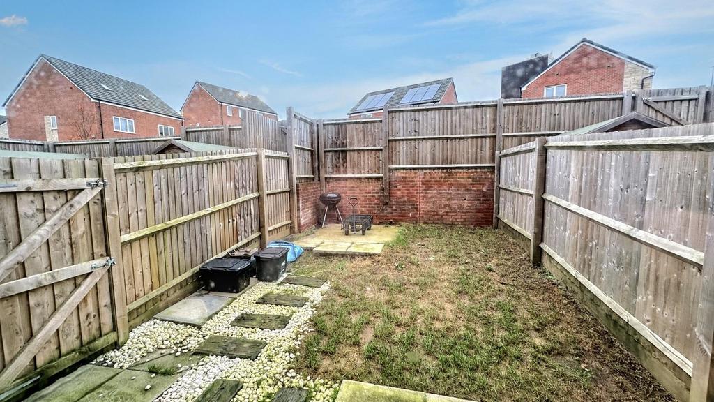 A spacious garden area with potential for outdo...