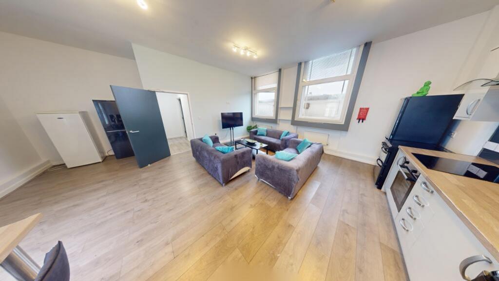 A spacious and inviting large modern living roo...