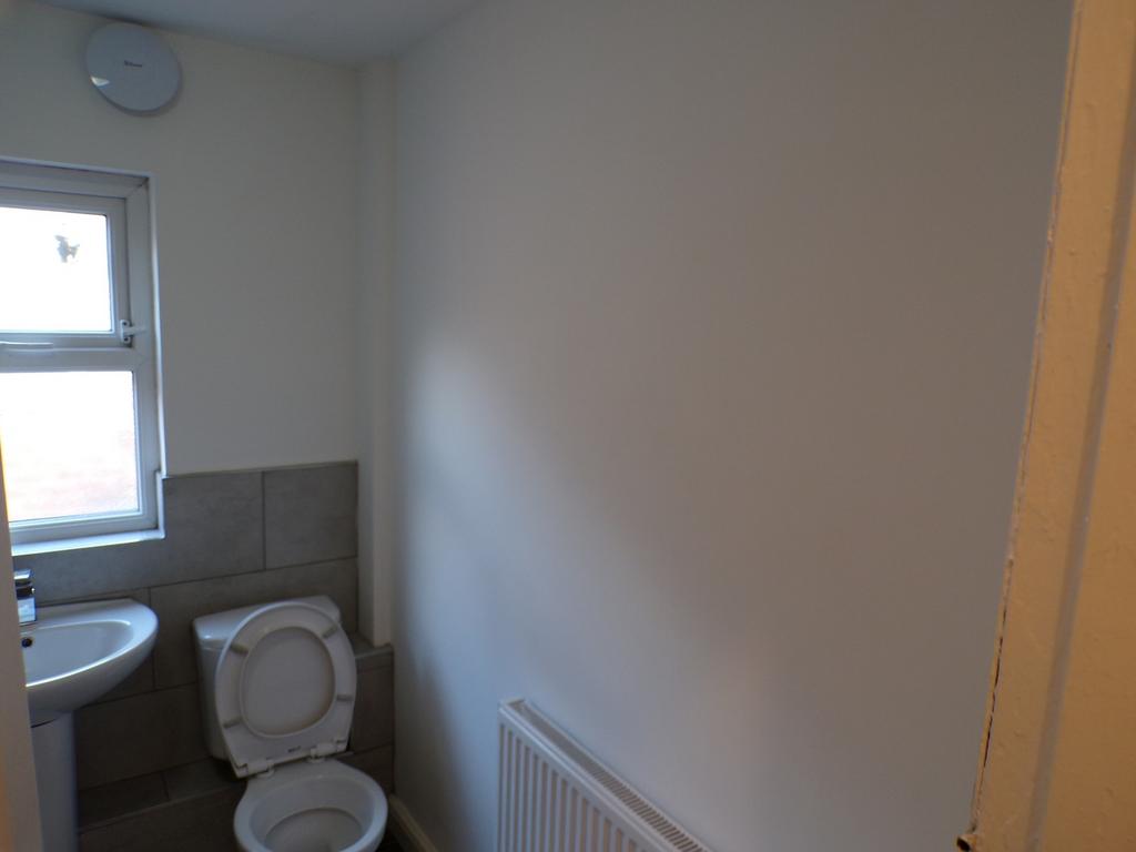 A well-maintained bathroom featuring essential ...