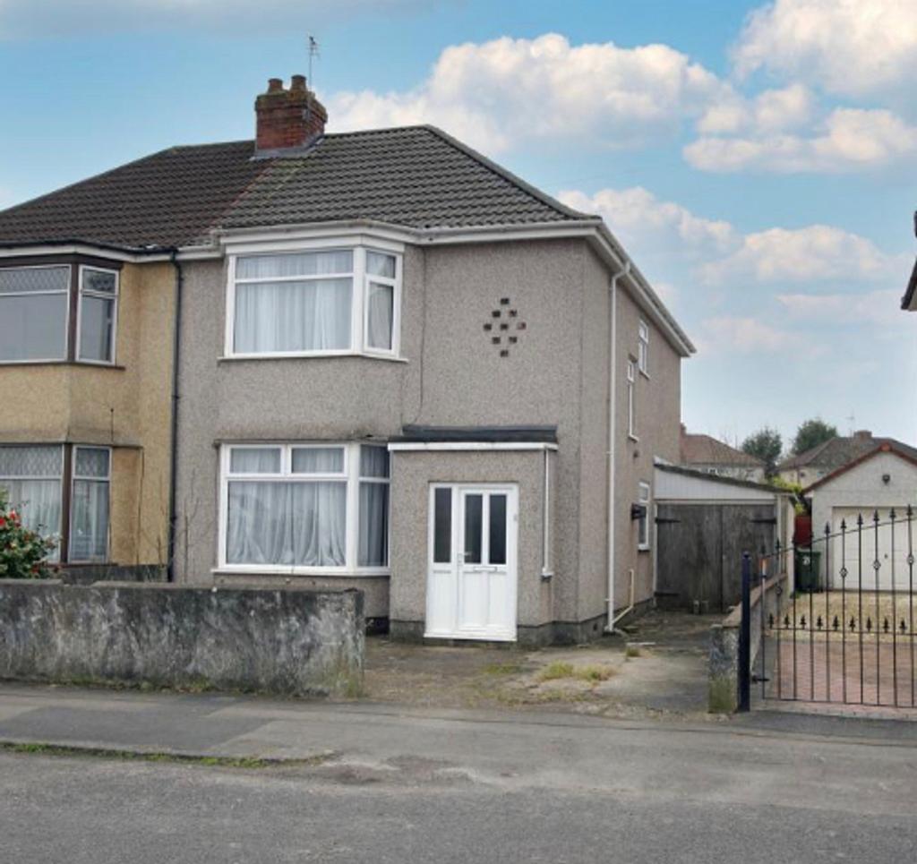 An inviting exterior view of a charming propert...