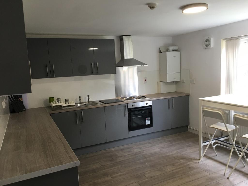 A modern and tidy kitchen with ample counter sp...