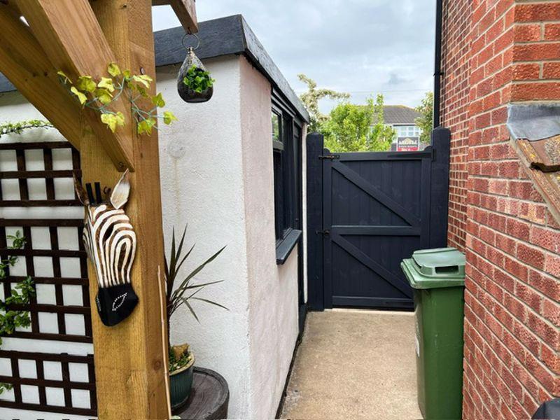 Rear gate passage