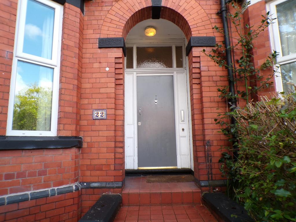 The charming entrance of a well-maintained prop...