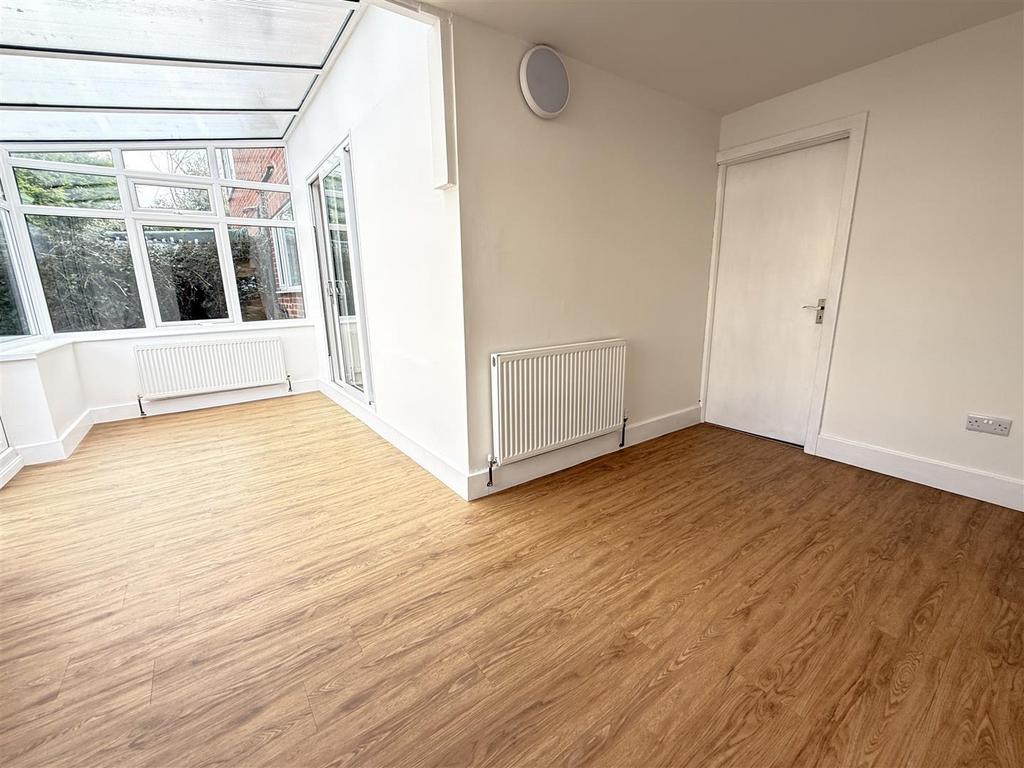 L shaped garden room/conservatory