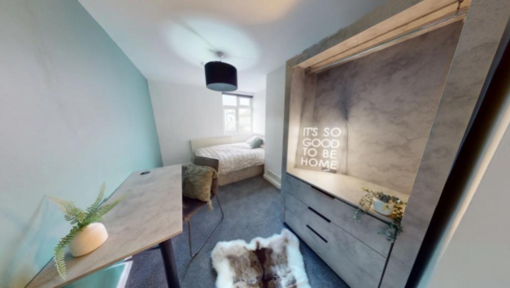 A stylish and inviting double bedroom featuring...