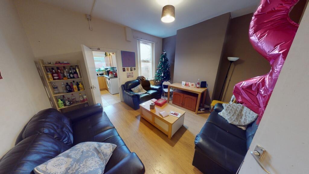 A cozy living room featuring comfortable leathe...