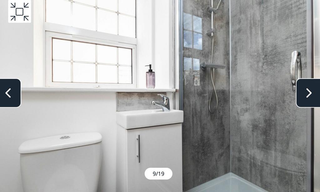 A modern and clean bathroom featuring a stylish...