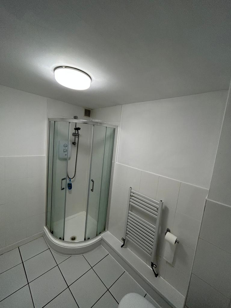 A modern and well-maintained bathroom featuring...