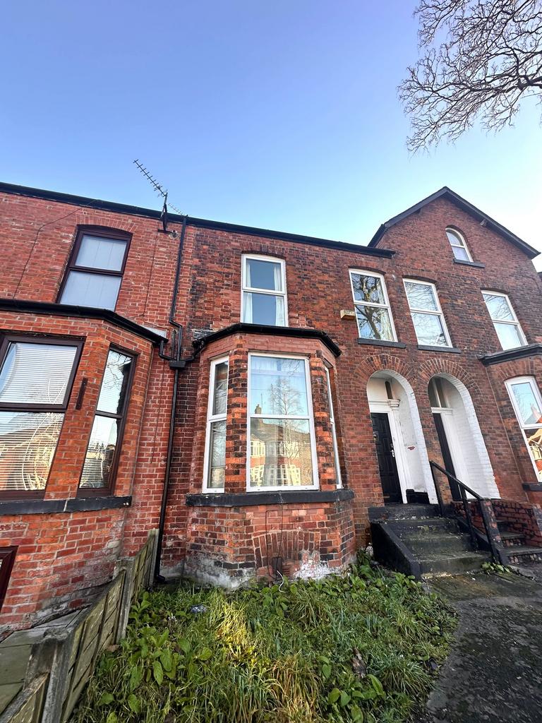 A charming exterior view of the property showca...