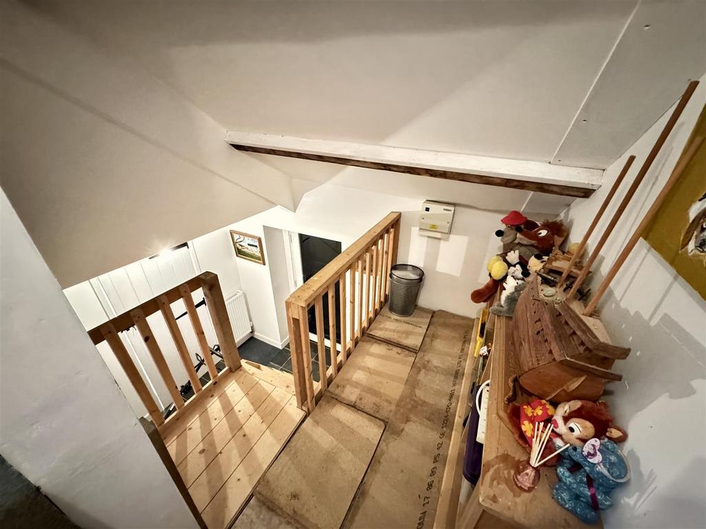 Stairs from hallway  up to landing