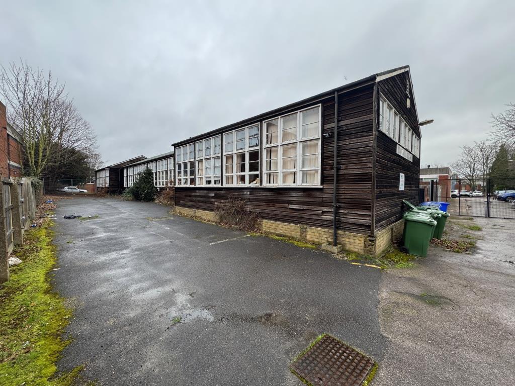 Side of property rear towards front