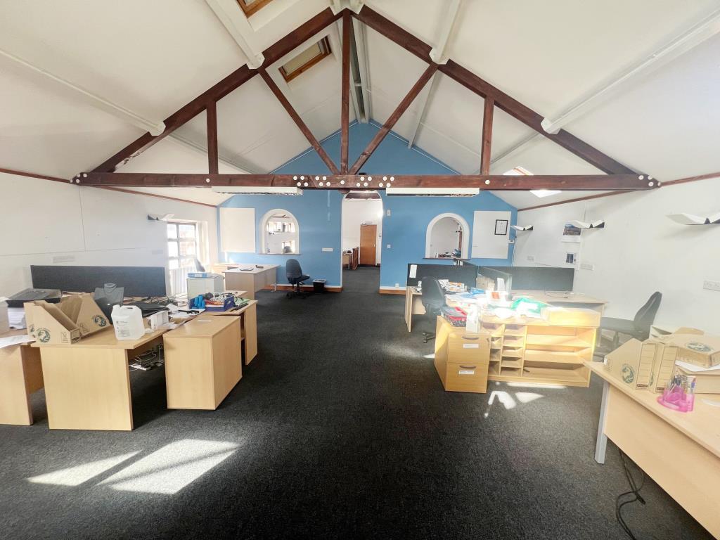 Office space with beamed ceiling