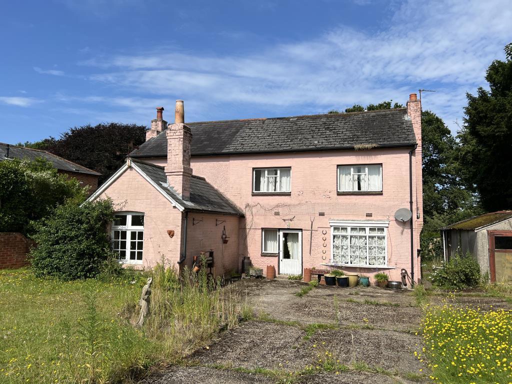 Detached cottage with hardstanding parking and gar