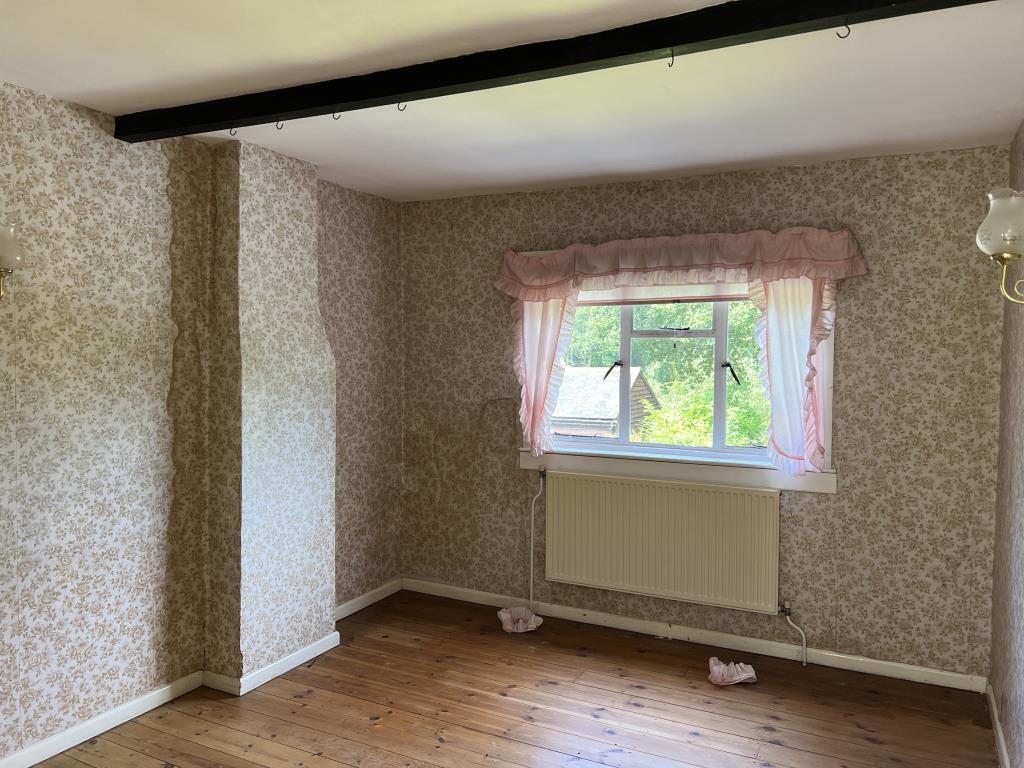 Bedroom two with window to rear garden
