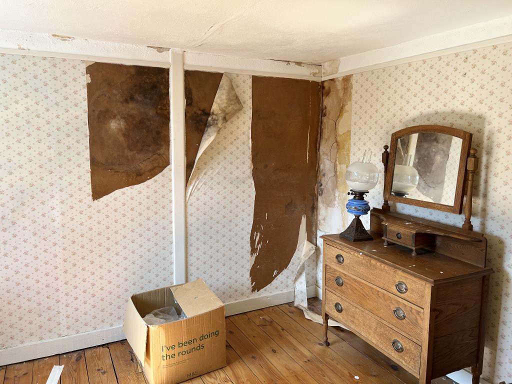 Bedroom three with wooden floor