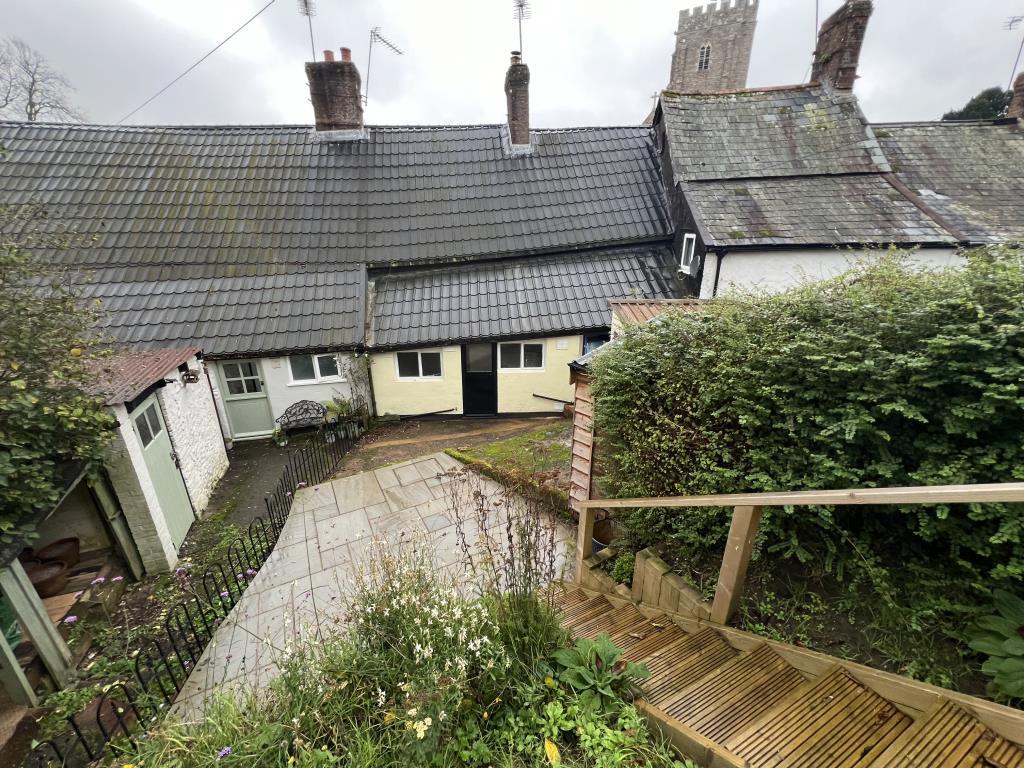 View from decking looking to patio area