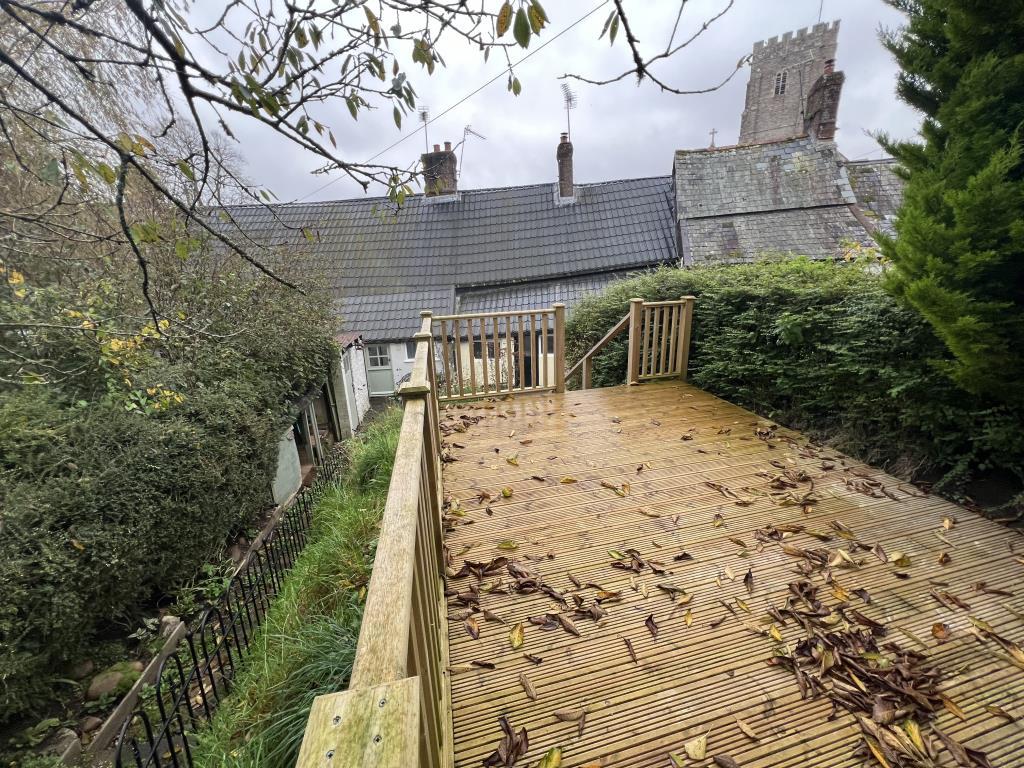 Decking area and rear view of property