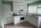 Kitchen with units, sink and oven