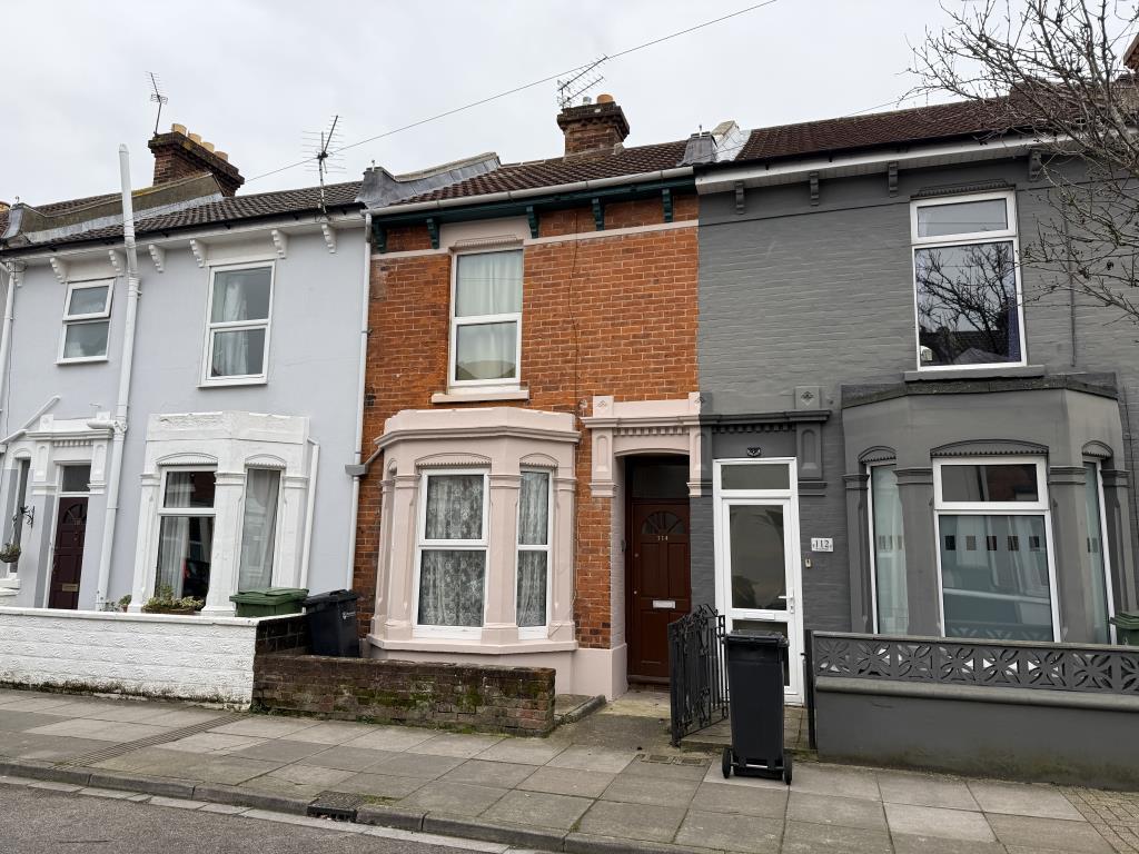 Terrace house with brick front elevation and paint
