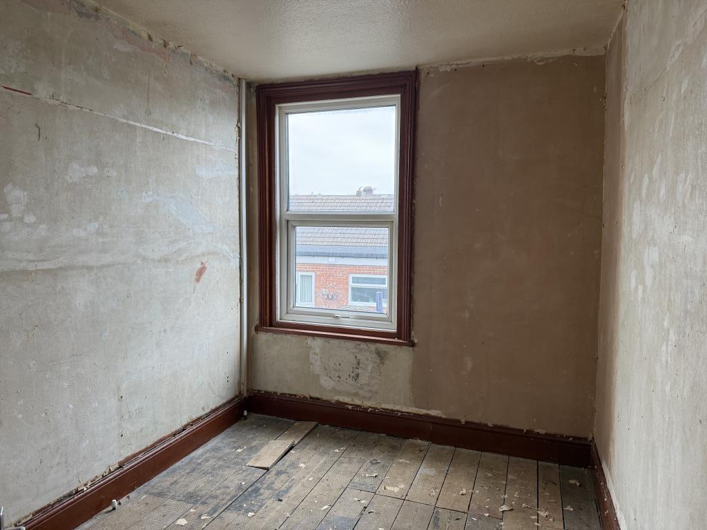 Bedroom three at rear of property
