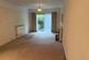 View of rear garden from living room sliding doors