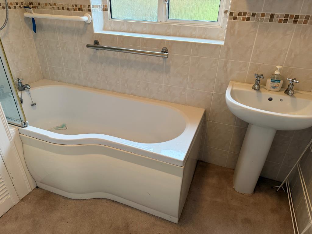 Bathroom with white suite