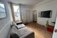 Communal living room in property
