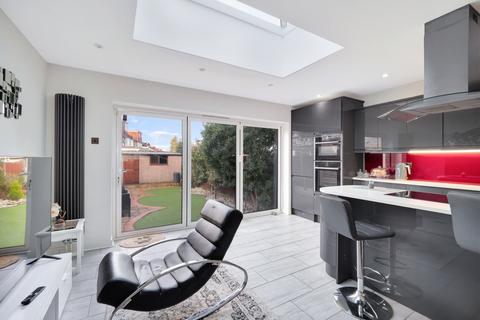 38 Wolsey Crescent, Morden, SM4 4TB