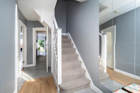 38 Wolsey Crescent, Morden, SM4 4TB
