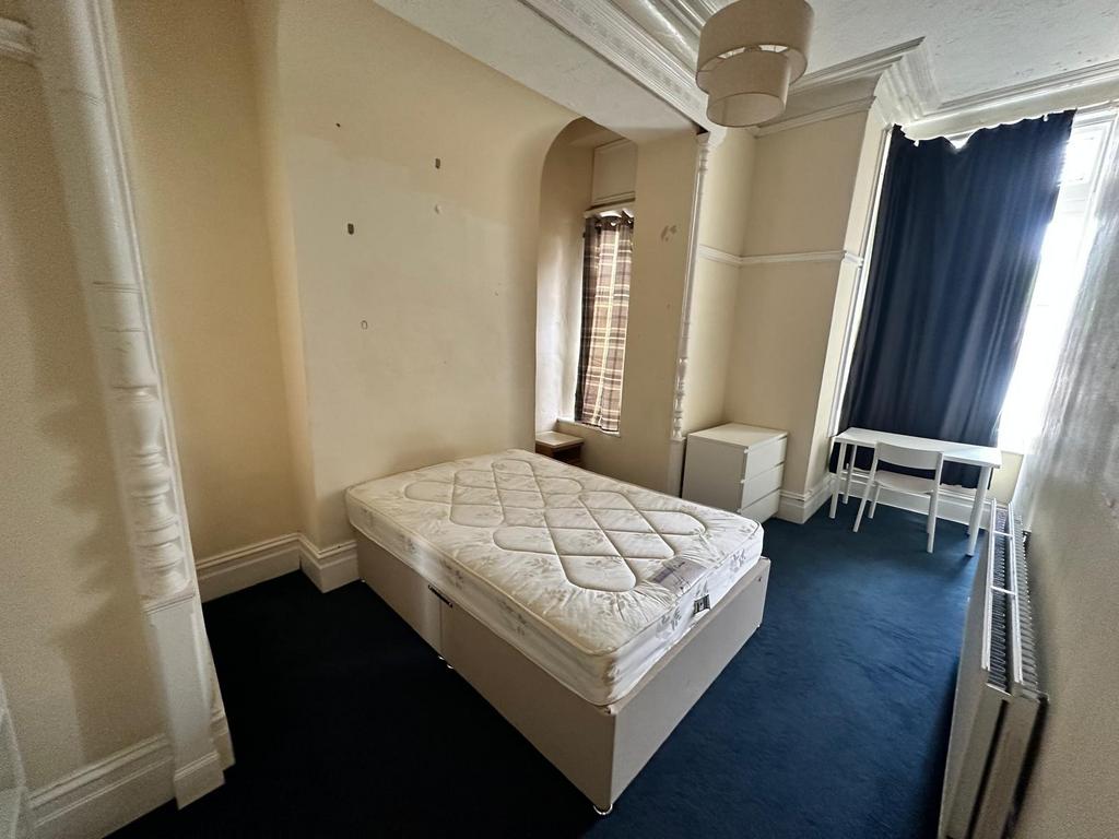 Bright double bedroom with a double divan bed, ...