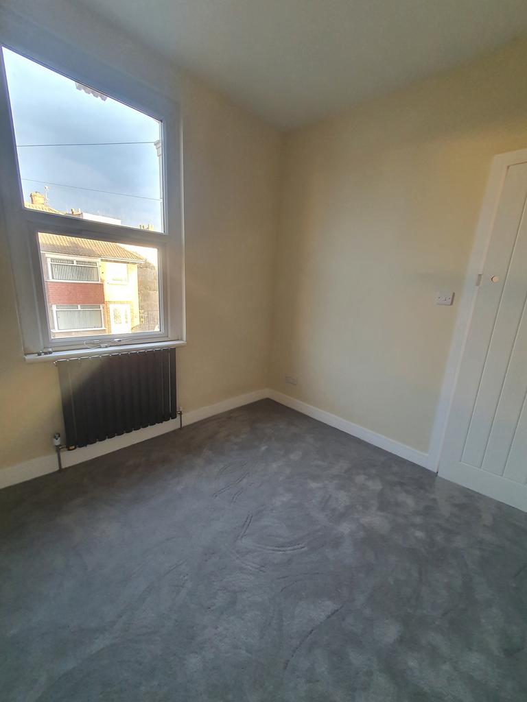 A bright and tidy double bedroom with ample nat...