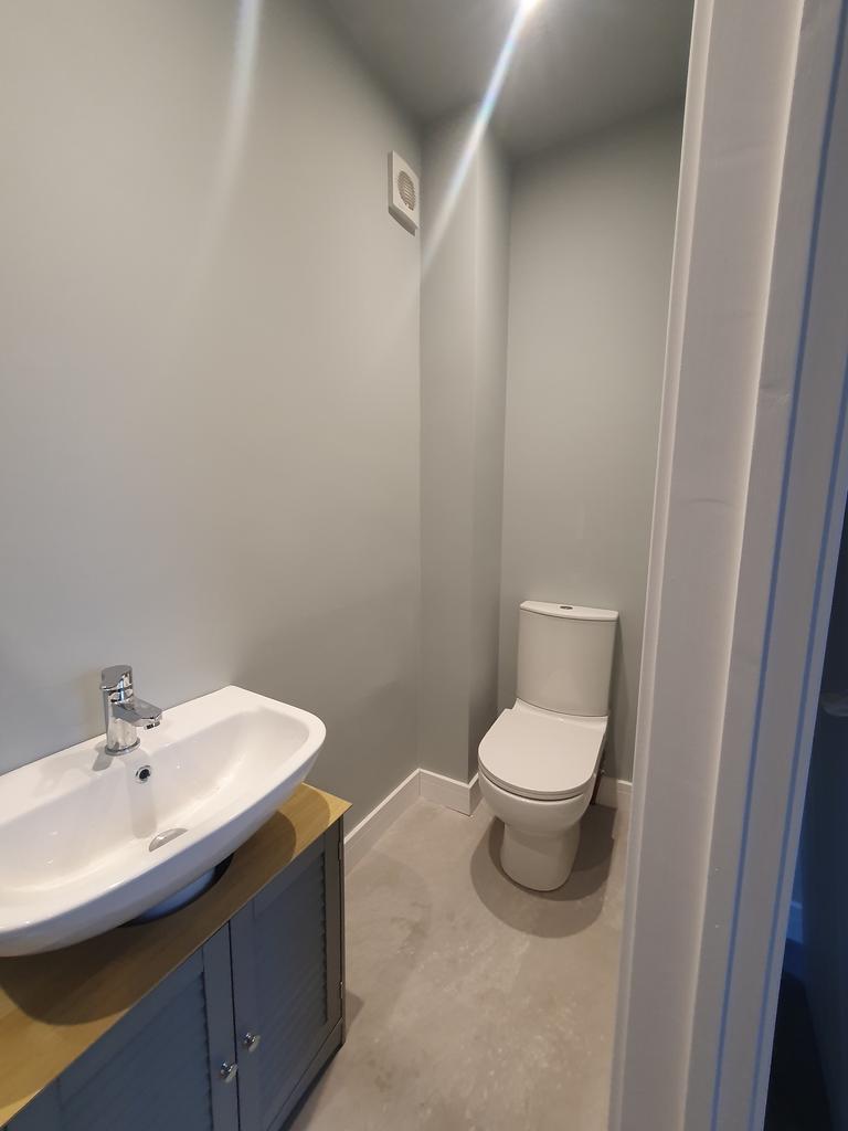 A modern and clean bathroom with stylish fixtur...