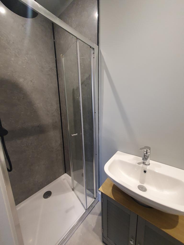 A modern and clean bathroom featuring a sleek s...
