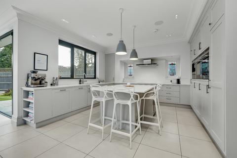 1 Grove End Lane, Esher, KT10 8JA