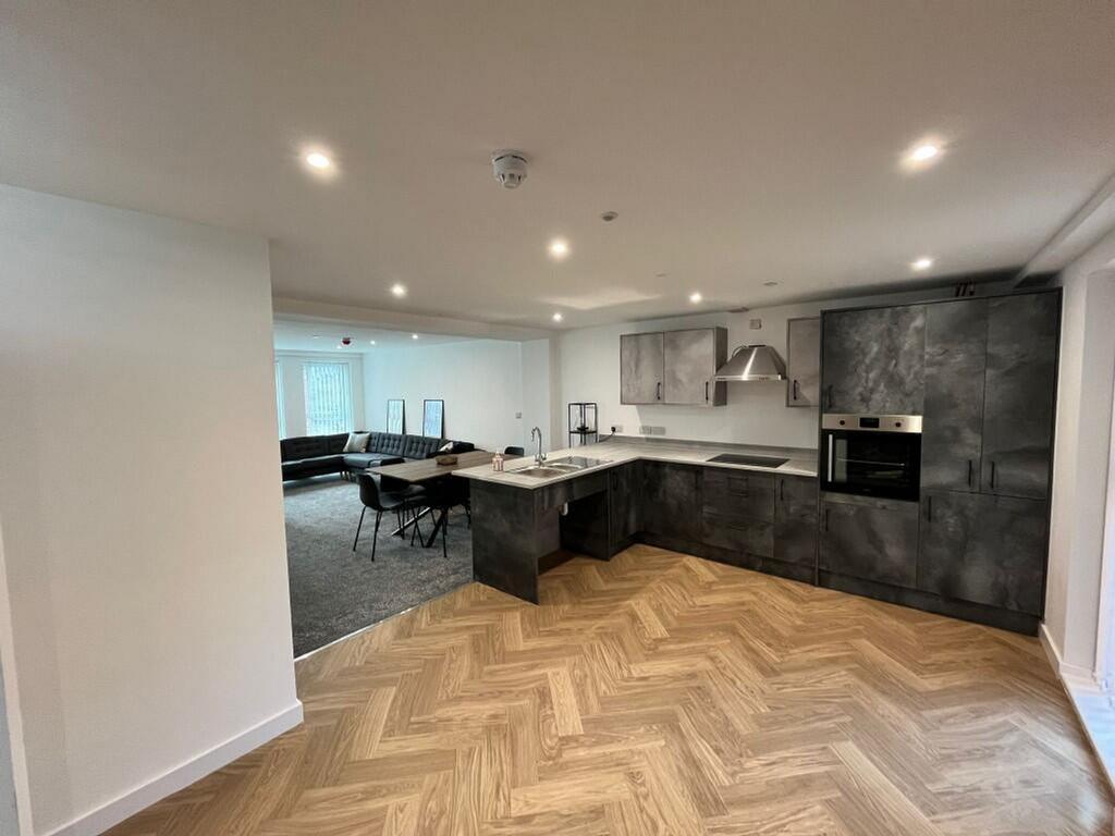 A modern and spacious kitchen area, perfect for...