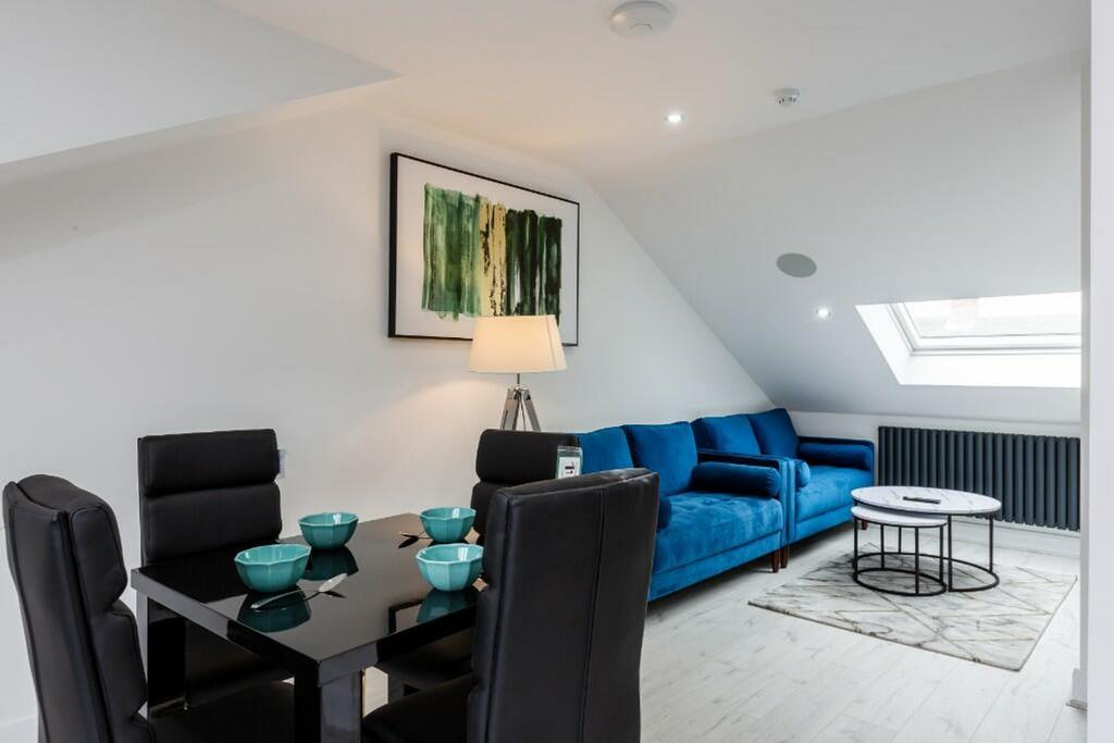 Spacious and inviting living room featuring a m...