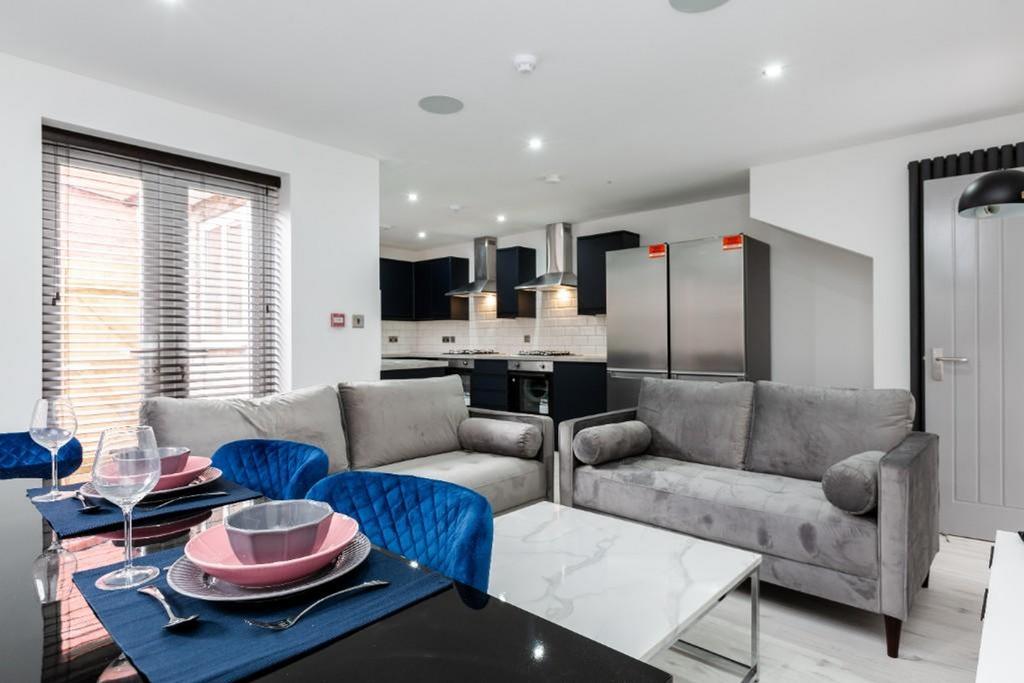 A spacious and stylish modern living room, perf...