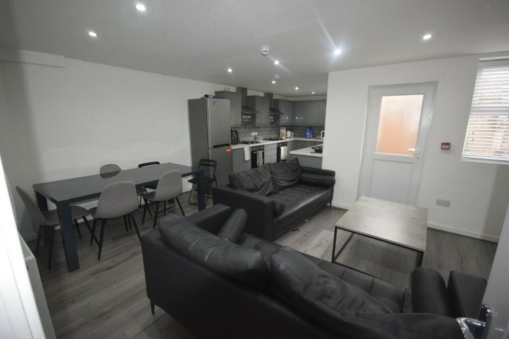 A spacious and bright modern living room, perfe...