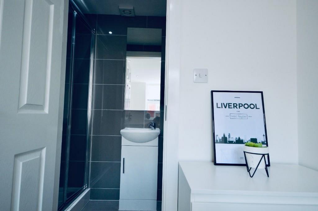 A modern and clean bathroom with stylish decor,...