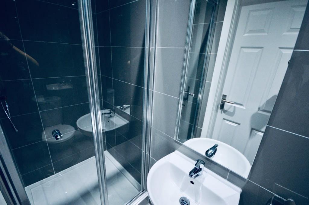 A modern and clean bathroom featuring a sleek d...