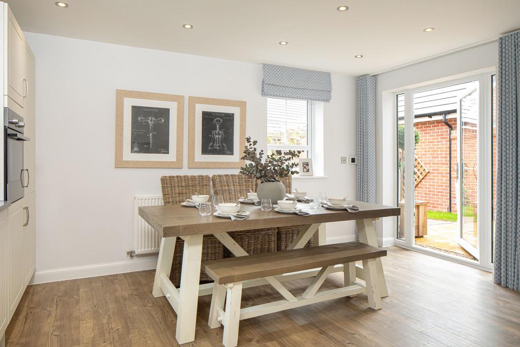 Open plan kitchen with dining area in the...