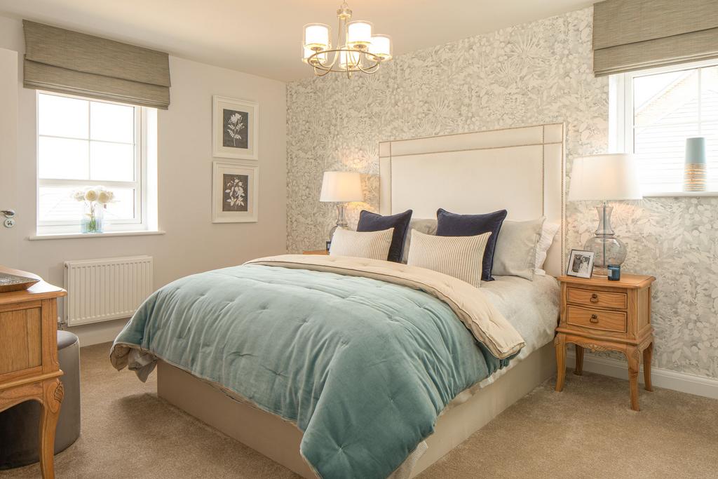 En suite main bedroom in the Alderney 4 bedroom...