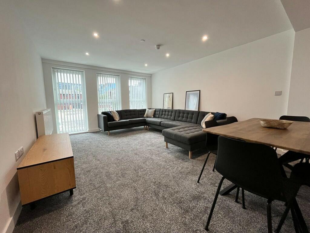 A spacious and bright modern living room, perfe...