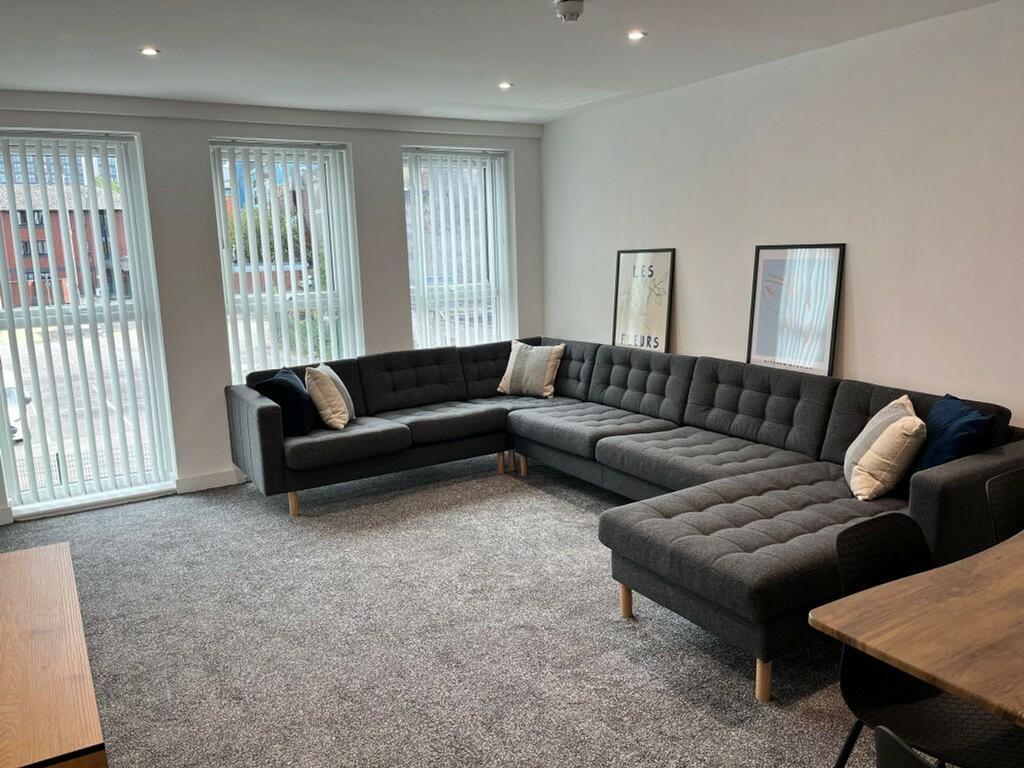 A spacious and inviting large modern living roo...