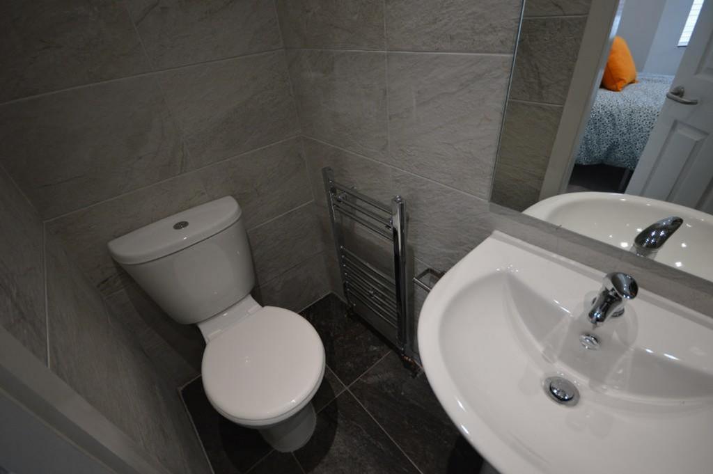 This compact single toilet features modern fixt...
